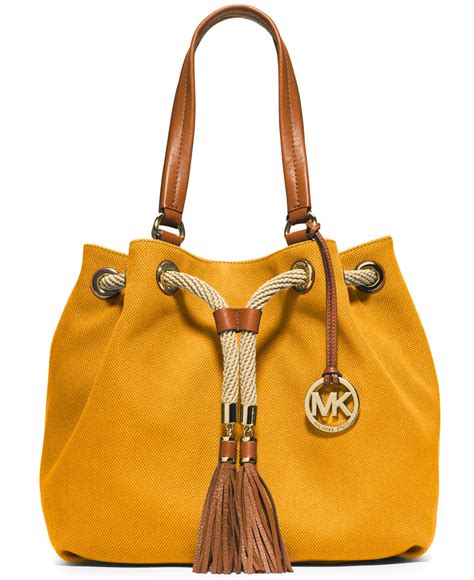 yellow michael kors kors tote|Michael Kors beige tote.